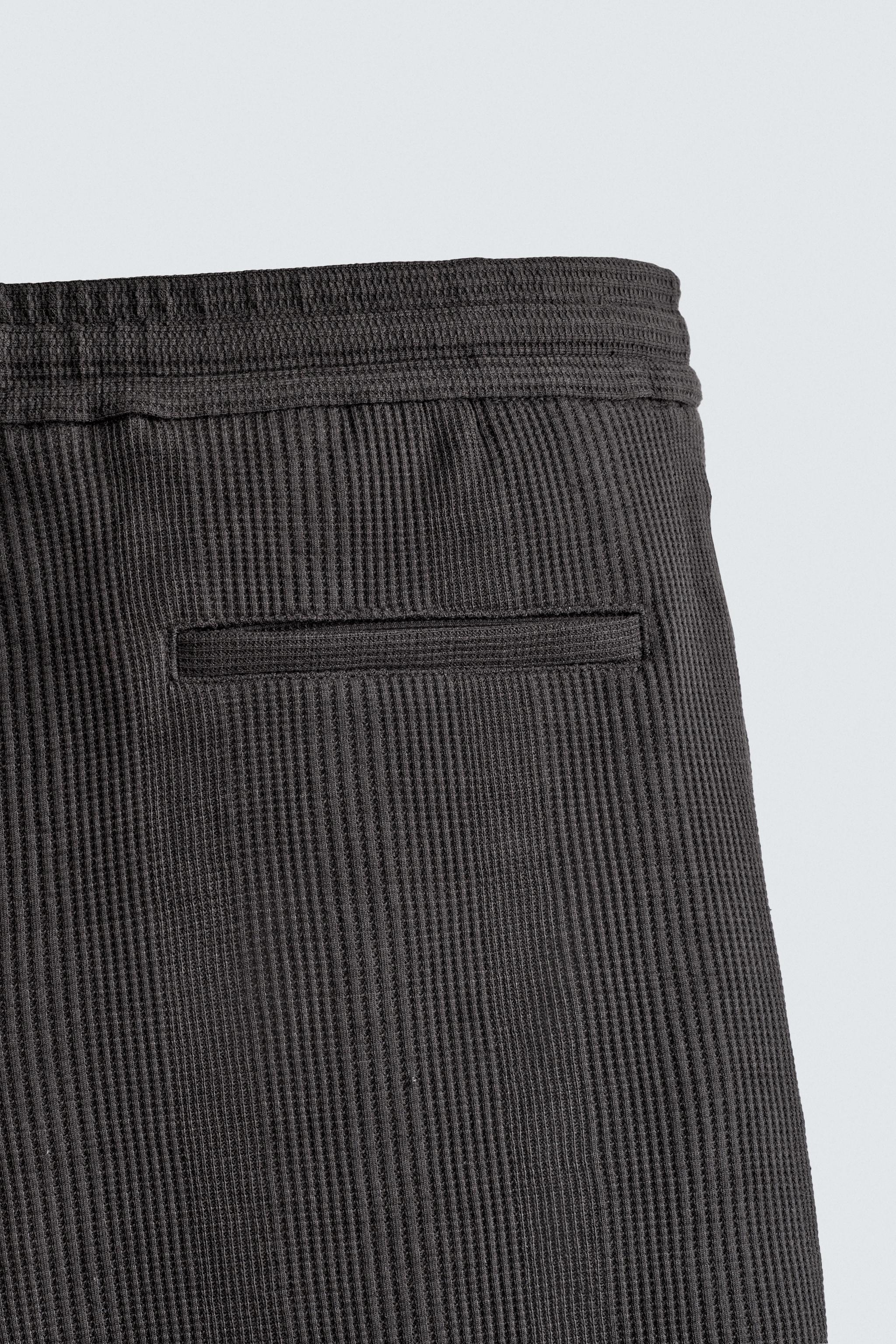 TEXTURED RELAXED FIT SHORTS